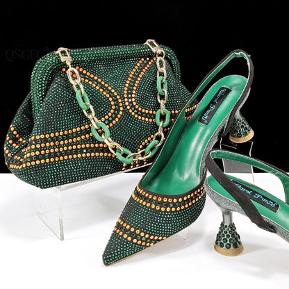 Women's pointed toe high heel court shoes in blue with rhinestone detail and a matching small bag.