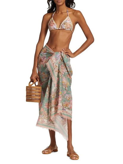 Women's creamy-white floral bikini set with detachable skirt for beach and pool use