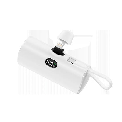 Capsule digital display wireless power bank showing battery percentage on screen, compact 79x34x26mm design with integrated plug