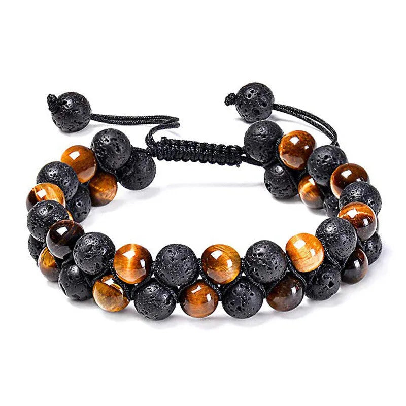 Tiger Eye and black agate geometric couple bracelets laid out as a matching set.