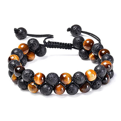 Tiger Eye and black agate geometric couple bracelets laid out as a matching set.