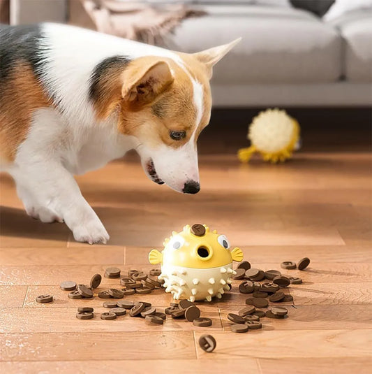 Green fish-shaped interactive dog toy with treat dispensing feature and internal bell for medium large dogs