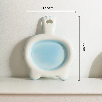 Ceramic cat bowl in blue colour with shallow mouth design for pet food and water.
