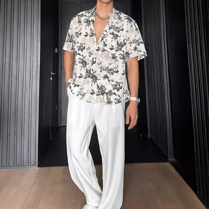 Loose casual short sleeve shirt with floral printed pattern in black colour option