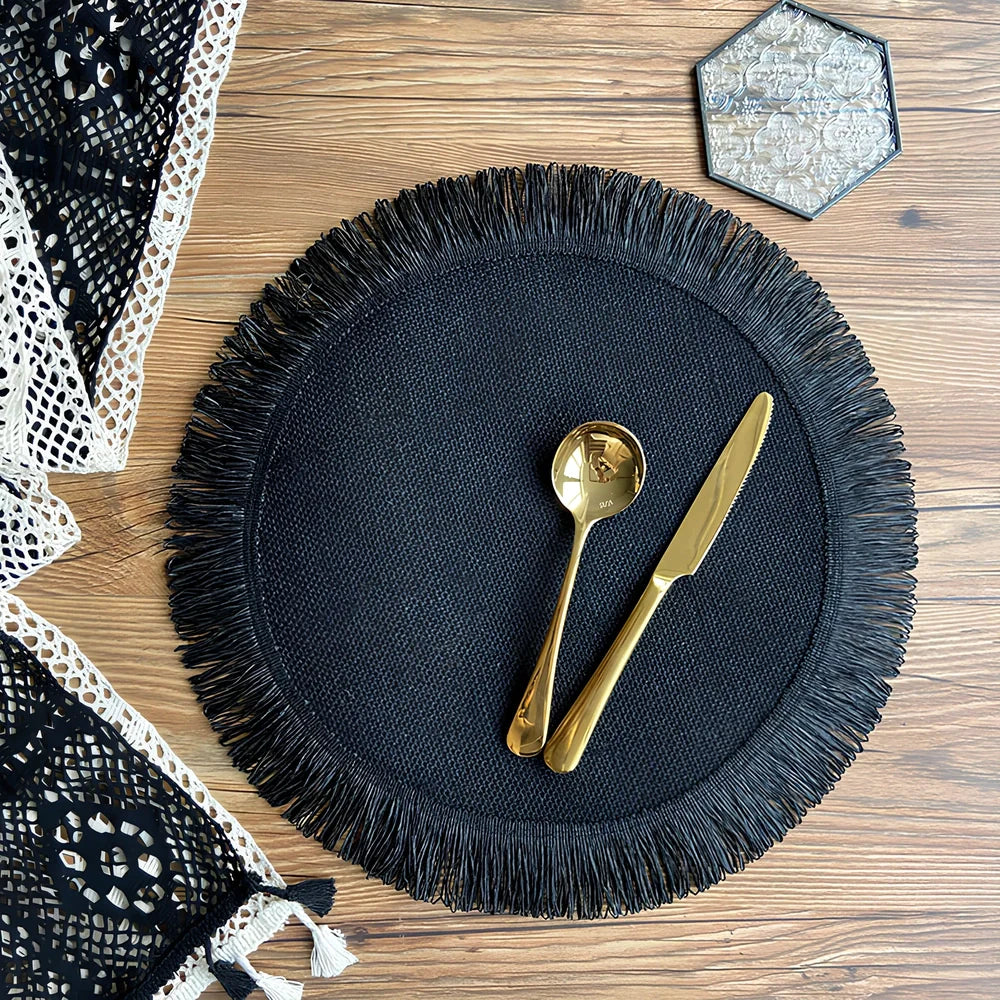 Round handwoven jute placemat with decorative tassels measuring 30cm diameter in Christmas green colour