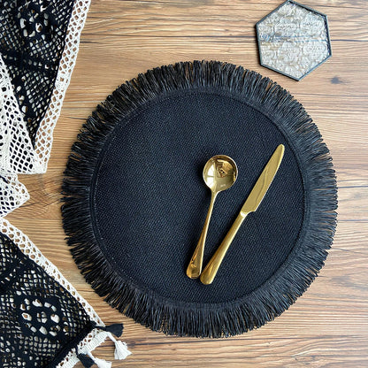 Round handwoven jute placemat with decorative tassels measuring 30cm diameter in Christmas green colour