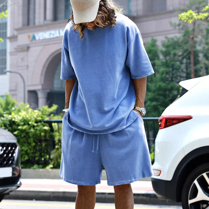 Men's loose sports set with round neck T-shirt and drawstring shorts in various colors