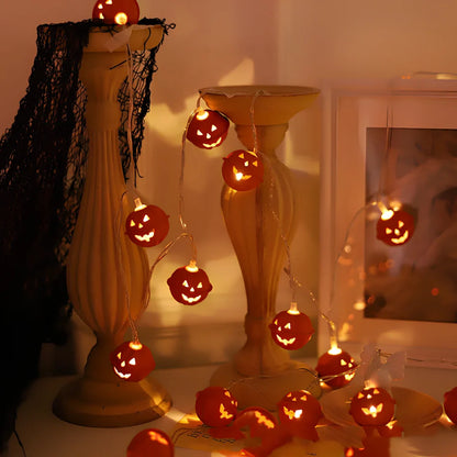 Halloween pumpkin string lights with iron shells, warm white illumination, battery operation