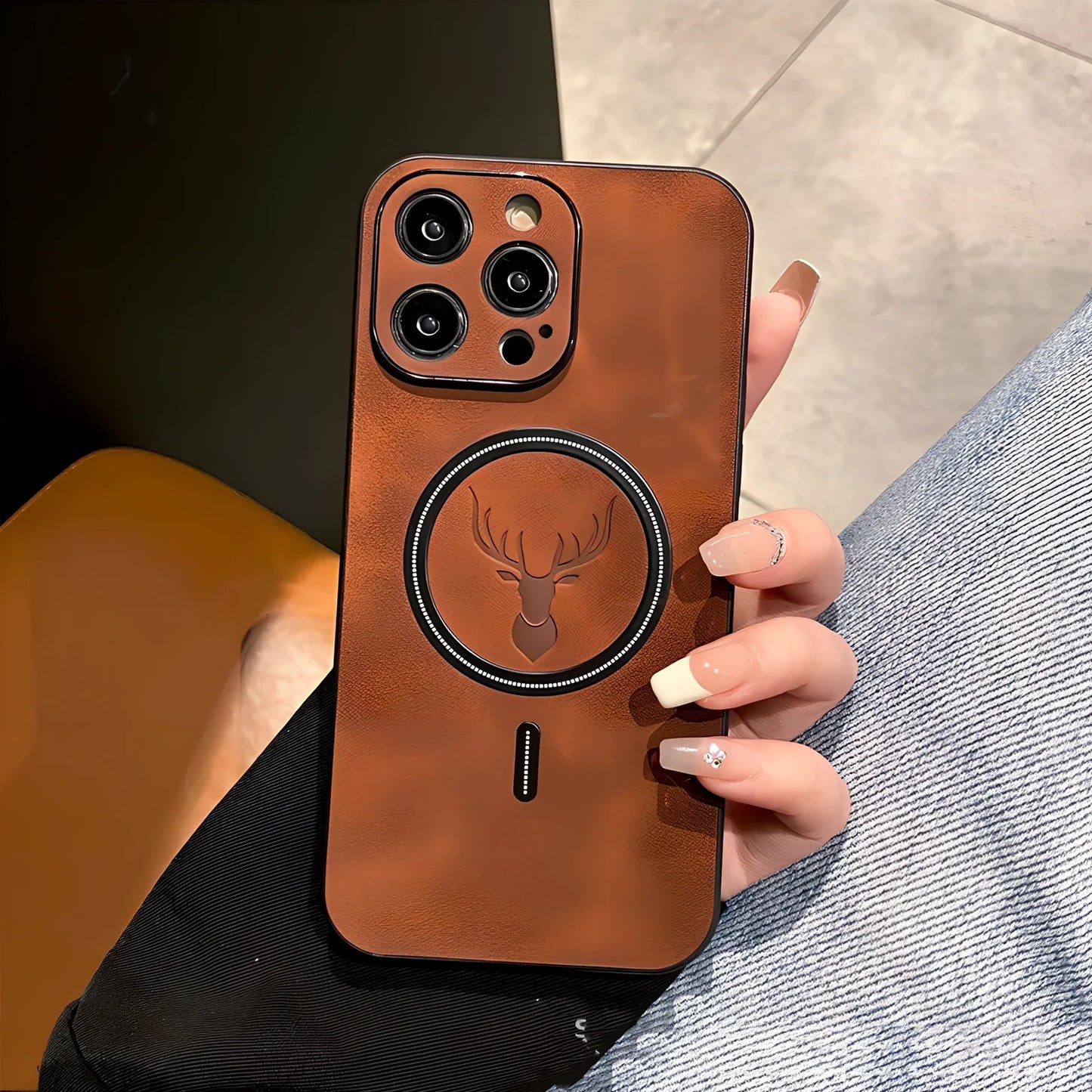 Elk magnetic suction phone case with cartoon design showing magnetic closure and imitation leather texture