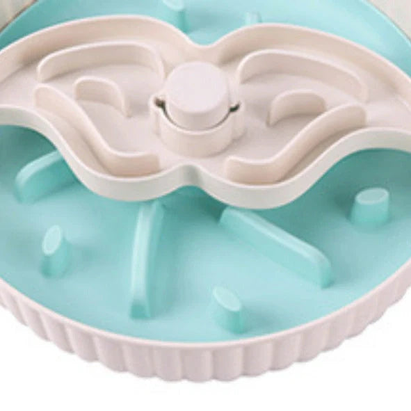 Grey rotating pet food basin with silicone pad showing beard pattern design for slow feeding