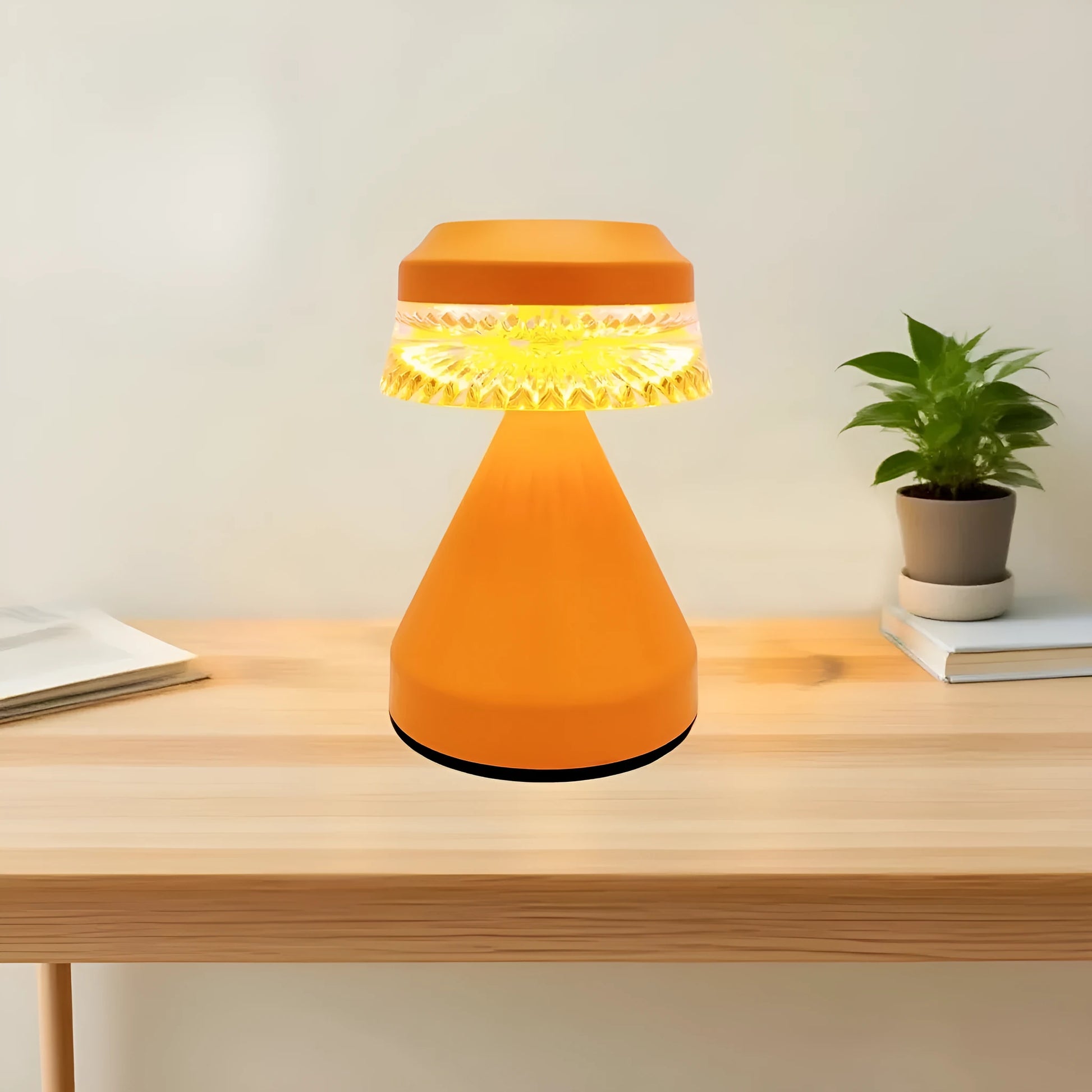 Small modern LED night lamp on a table with USB cable, shown in black, brown, and orange colour options.