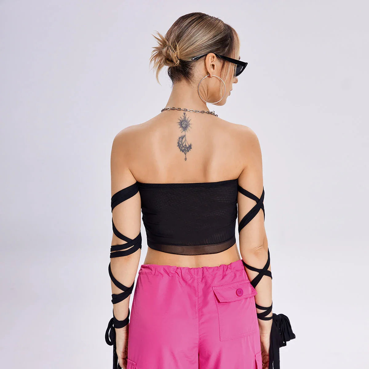 Stylish women's black tank top with elastic cross-arm design, perfect for casual summer wear