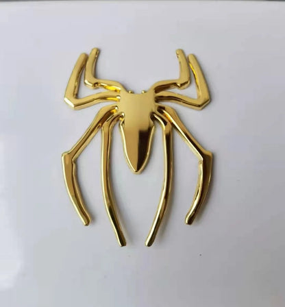 Three-dimensional metal spider bumper sticker in zinc alloy measuring 7cm by 5cm