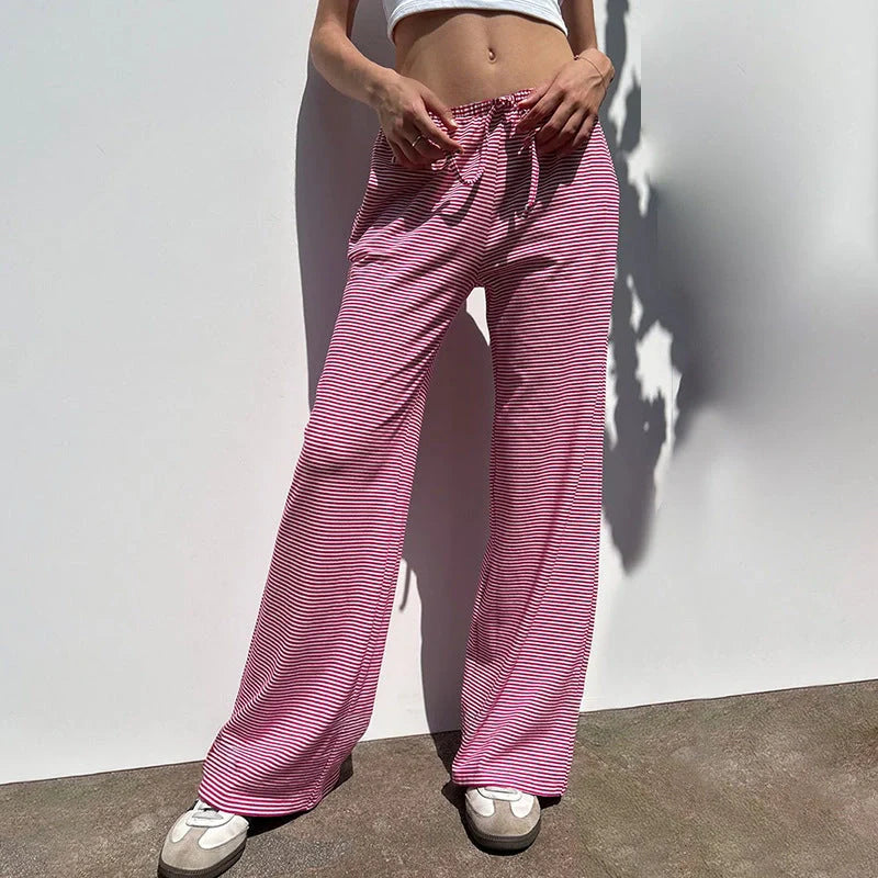 Stylish women's striped pants in various colors with a casual, Y2K-inspired design