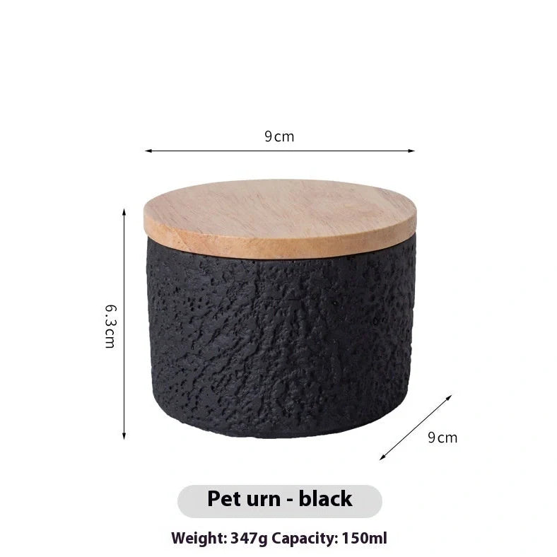 Handmade cement cinerary casket for pet ashes in six colours: black, grey, green, pink, white, yellow