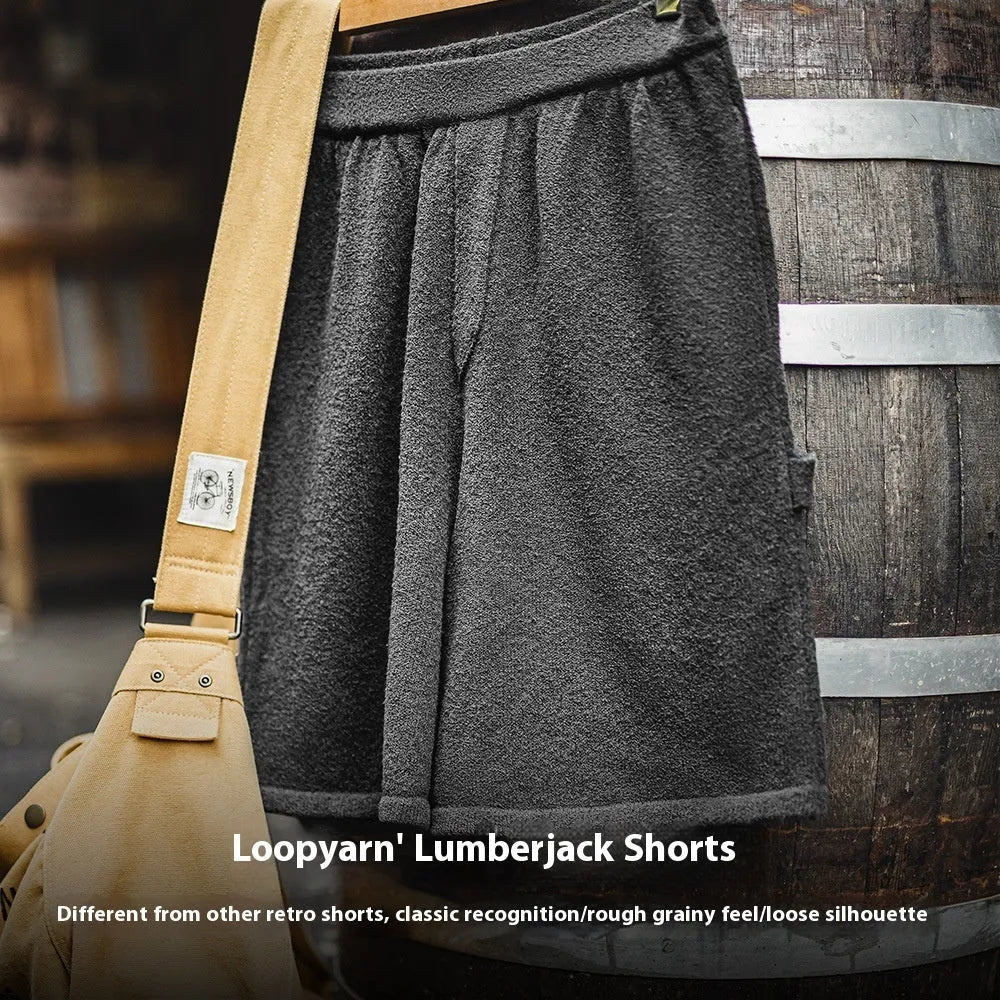 Cement grey men's straight-leg athletic shorts with a loose fit and elasticated waistband.
