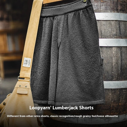 Cement grey men's straight-leg athletic shorts with a loose fit and elasticated waistband.