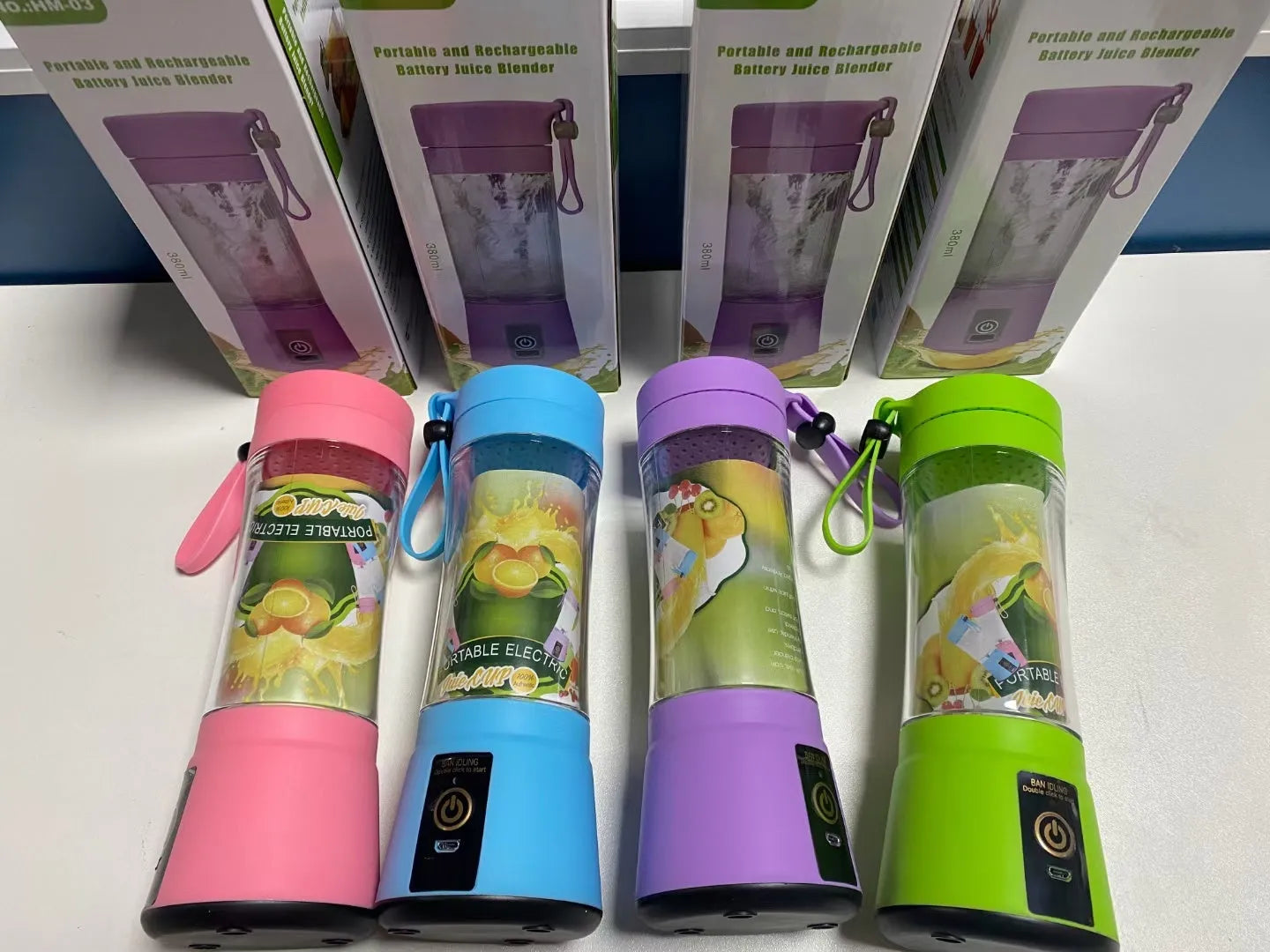 Portable USB rechargeable blender with pink colour option showing cup and six-blade design