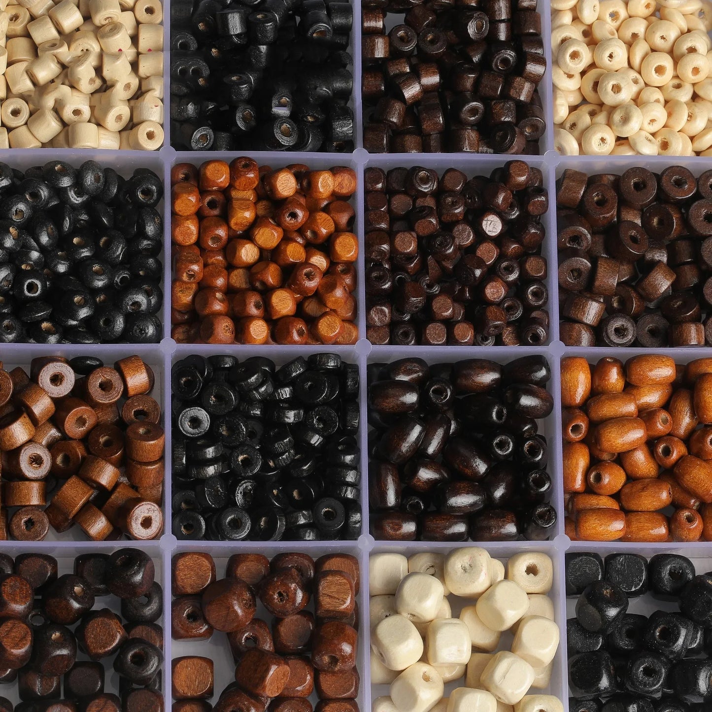 Mixed vintage solid wood beads scattered for DIY jewellery making and craft projects