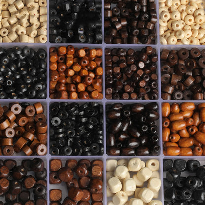 Mixed vintage solid wood beads scattered for DIY jewellery making and craft projects