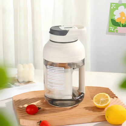 1.5 litre portable blender juicer with wireless charging in green, grey, orange, or pink colours