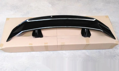 Car punch-free spoiler in ABS plastic showing adhesive mounting surface and finish options