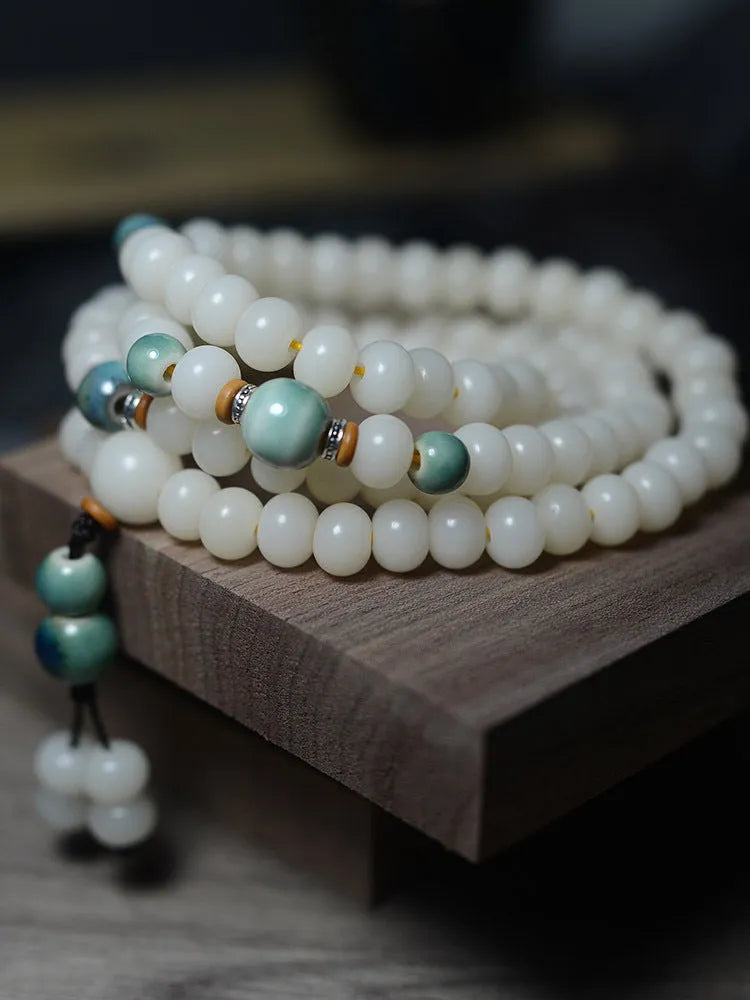 White jade bodhi seed bracelet with 108 flat round oblate beads