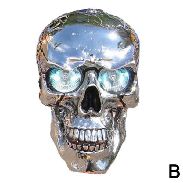 A spooky and stylish LED motorcycle headlight in the shape of a resin skull, perfect for Halloween or adding a unique touch to your daily ride.