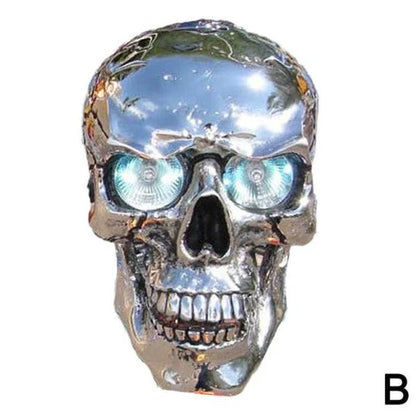 A spooky and stylish LED motorcycle headlight in the shape of a resin skull, perfect for Halloween or adding a unique touch to your daily ride.