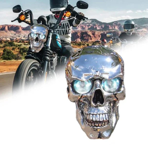 A spooky and stylish LED motorcycle headlight in the shape of a resin skull, perfect for Halloween or adding a unique touch to your daily ride.