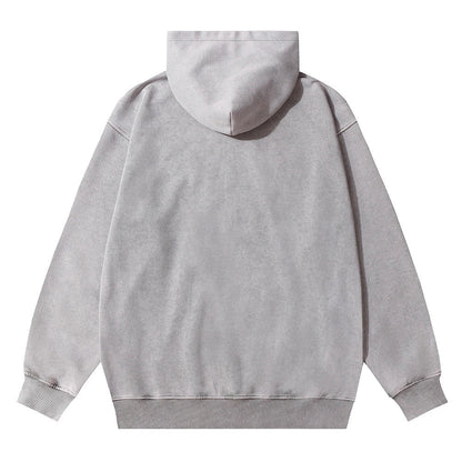 A brown cotton pullover hoodie with an embroidered letter patch design, perfect for casual and comfortable fall fashion.