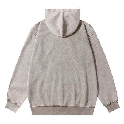 A brown cotton pullover hoodie with an embroidered letter patch design, perfect for casual and comfortable fall fashion.