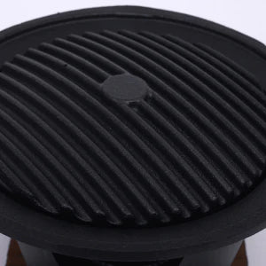 Compact and portable mini barbecue grill with Japanese-inspired design for solo or small-scale outdoor cooking