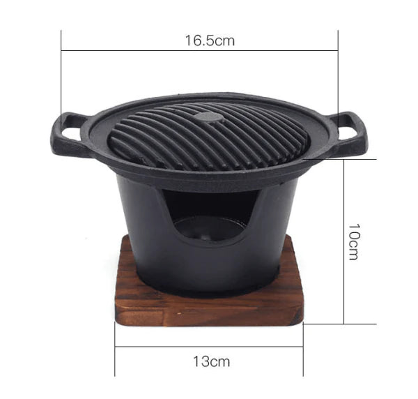 Compact and portable mini barbecue grill with Japanese-inspired design for solo or small-scale outdoor cooking