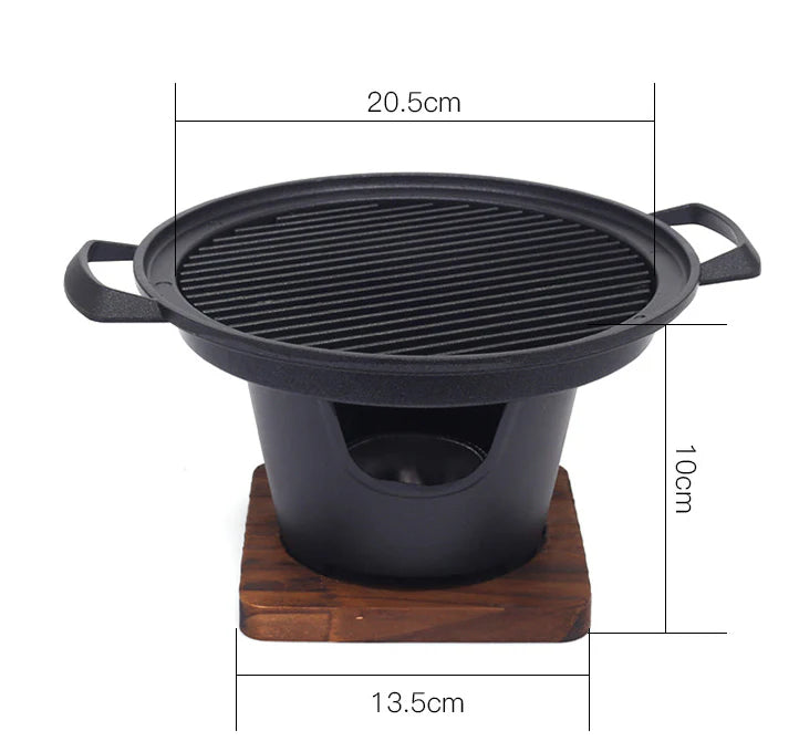Compact and portable mini barbecue grill with Japanese-inspired design for solo or small-scale outdoor cooking