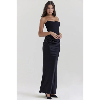 Elegant black strapless backless maxi dress for women, featuring a sleek bodycon silhouette and ankle-length sophistication.
