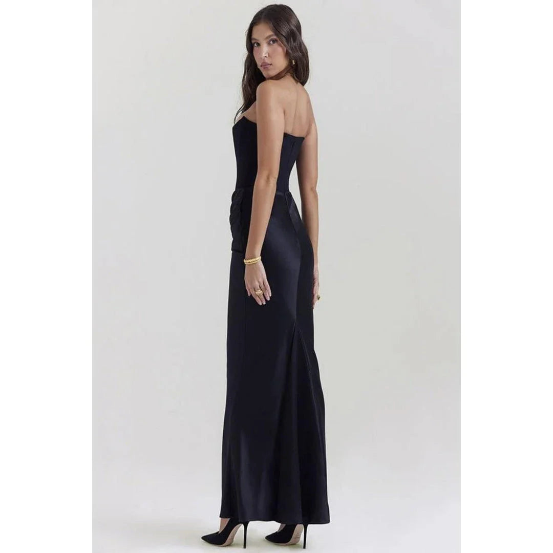 Elegant black strapless backless maxi dress for women, featuring a sleek bodycon silhouette and ankle-length sophistication.