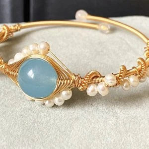 Elegant 14K gold-wrapped bracelet with natural white pearls and Hailan Baohai sapphires