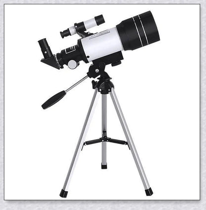 Professional astronomical telescope with adjustable tripod, Barlow lens, and eyepieces for clear, high-resolution views of the night sky