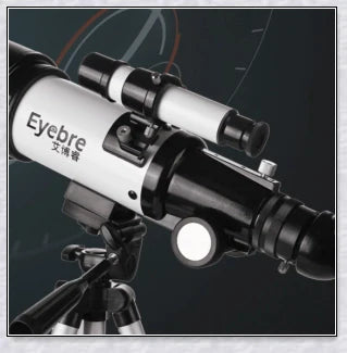 Professional astronomical telescope with adjustable tripod, Barlow lens, and eyepieces for clear, high-resolution views of the night sky