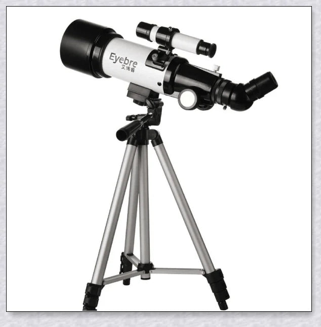 Professional astronomical telescope with adjustable tripod, Barlow lens, and eyepieces for clear, high-resolution views of the night sky