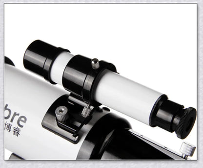 Professional astronomical telescope with adjustable tripod, Barlow lens, and eyepieces for clear, high-resolution views of the night sky