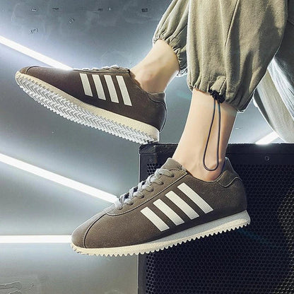 Forrest Sports Youth Running Shoes in classic black, featuring a sleek, frosted leather upper and durable rubber sole for superior comfort and performance.