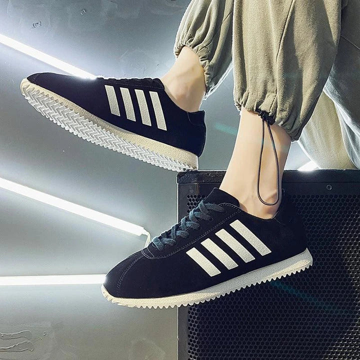 Forrest Sports Youth Running Shoes in classic black, featuring a sleek, frosted leather upper and durable rubber sole for superior comfort and performance.