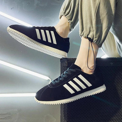 Forrest Sports Youth Running Shoes in classic black, featuring a sleek, frosted leather upper and durable rubber sole for superior comfort and performance.