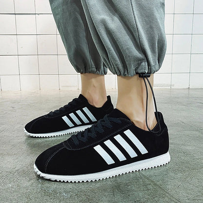 Forrest Sports Youth Running Shoes in classic black, featuring a sleek, frosted leather upper and durable rubber sole for superior comfort and performance.