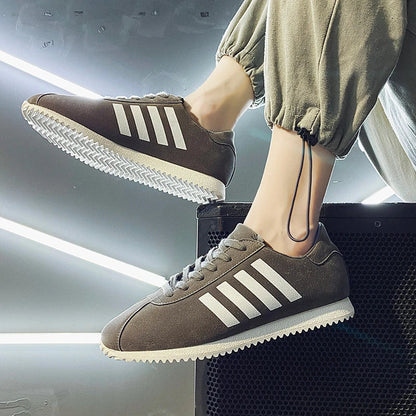 Forrest Sports Youth Running Shoes in classic black, featuring a sleek, frosted leather upper and durable rubber sole for superior comfort and performance.