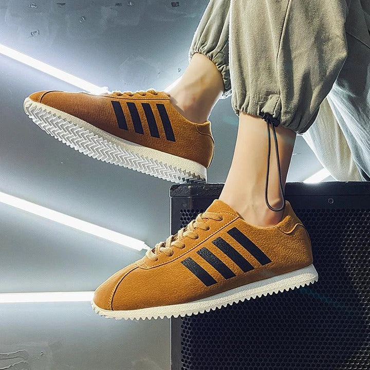 Forrest Sports Youth Running Shoes in classic black, featuring a sleek, frosted leather upper and durable rubber sole for superior comfort and performance.