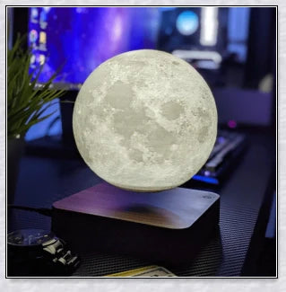 Lunamen - Magnetic Levitating Moon Lamp that rotates and levitates above a magnetic base, displaying the moon's detailed surface.