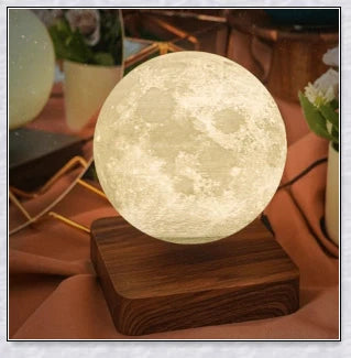 Lunamen - Magnetic Levitating Moon Lamp that rotates and levitates above a magnetic base, displaying the moon's detailed surface.